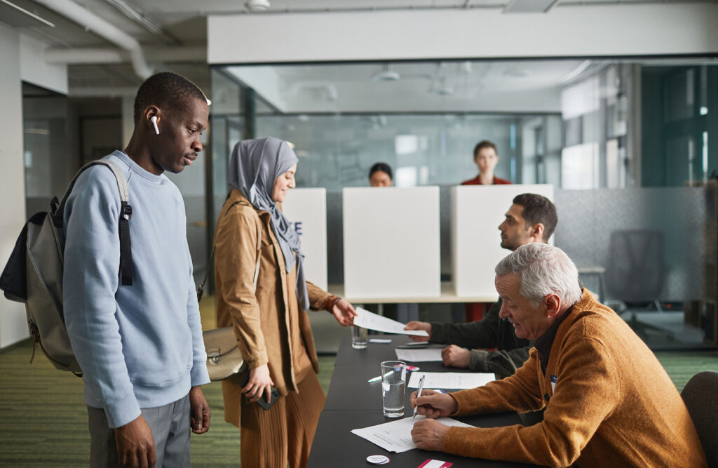 Voters at the voting station