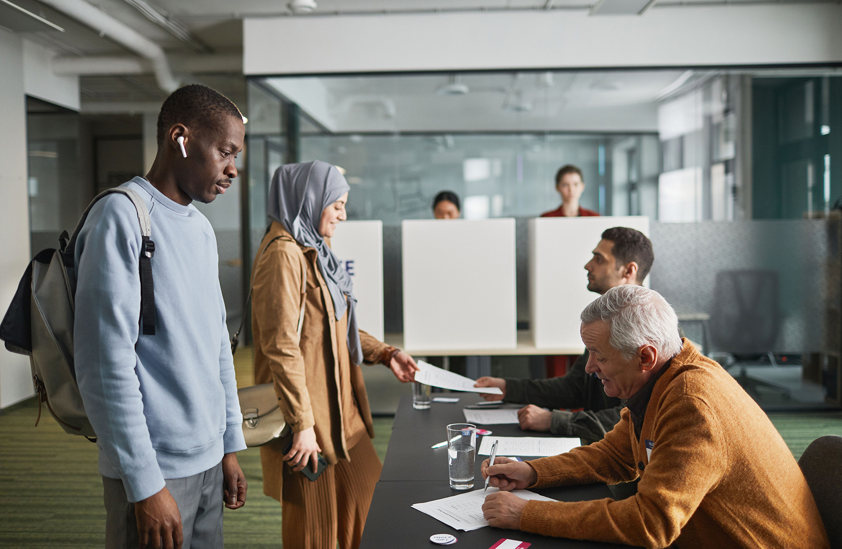 Voters at the voting station
